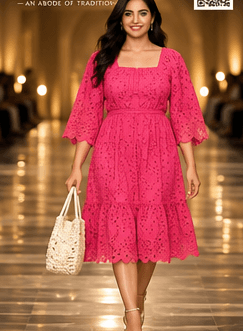 Indian model in a soft pink boutique dress